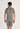 Back view of a men model wearing HO grey  Tee-Shirt V Neck