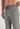 Close-up view of a men model wearing HO grey  Trousers