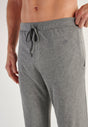 Close-up view of a men model wearing HO grey  Trousers