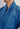 Close-up view of a men model wearing HO blue  Robe