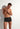 Front view of a men model wearing HO black  Trunk