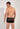 Back view of a men model wearing HO black  Trunk