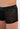 Close-up view of a men model wearing HO black  Trunk
