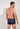 Back view of a men model wearing HO navy  Trunk