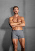 Full-body view of a men model wearing HO grey  Comfort Boxer Briefs