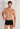 Front view of a men model wearing HO black cotton Boxer Briefs HO1