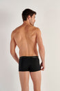 Back view of a men model wearing HO black cotton Boxer Briefs HO1