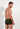 Back view of a men model wearing HO dark khaki cotton Boxer Briefs HO1
