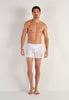 Full-body view of a men model wearing HO white cotton Long Boxer Briefs HO1