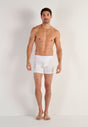 Full-body view of a men model wearing HO white cotton Long Boxer Briefs HO1