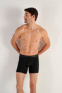 Front view of a men model wearing HO black cotton Long Boxer Briefs HO1
