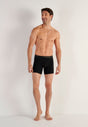 Full-body view of a men model wearing HO black cotton Long Boxer Briefs HO1