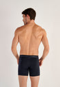 Back view of a men model wearing HO navy cotton Long Boxer Briefs HO1