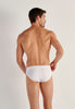 Back view of a men model wearing HO white cotton Briefs HO1