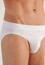 Close-up view of a men model wearing HO white cotton Briefs HO1
