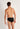 Back view of a men model wearing HO black cotton Briefs HO1