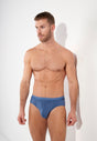 Front view of a men model wearing HO jeans blue cotton Briefs HO1