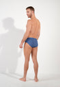 General view of a men model wearing HO jeans blue cotton Briefs HO1