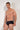 Front view of a men model wearing HO black  Swim Midi Briefs