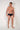 Full-body view of a men model wearing HO black  Swim Midi Briefs