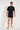 Full-body view of a men model wearing HO black combination cotton Tee-Shirt Crew Neck