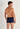 Back view of a men model wearing HO black/navy cotton Boxer Briefs HO1 2p