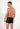 Back view of a men model wearing HO black print  Boxer Briefs