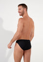 Back view of a men model wearing HO black print  Comfort Micro Briefs