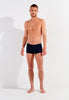 Full-body view of a men model wearing HO navy modal/viscose/tencel Comfort Boxer Briefs