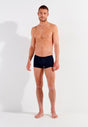 Full-body view of a men model wearing HO navy modal/viscose/tencel Comfort Boxer Briefs