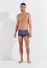 Full-body view of a men model wearing HO grey modal/viscose/tencel Comfort Boxer Briefs