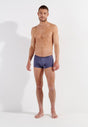 Full-body view of a men model wearing HO grey modal/viscose/tencel Comfort Boxer Briefs