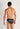 Back view of a men model wearing HO black/white stripes modal/viscose/tencel Comfort Micro Briefs