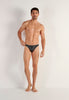 Full-body view of a men model wearing HO black/white stripes modal/viscose/tencel Comfort Micro Briefs