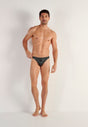 Full-body view of a men model wearing HO black/white stripes modal/viscose/tencel Comfort Micro Briefs