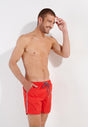 Front view of a men model wearing HO red  Beach Boxer