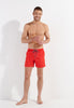 Full-body view of a men model wearing HO red  Beach Boxer