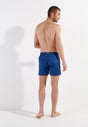General view of a men model wearing HO navy  Beach Boxer