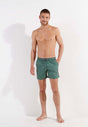 Full-body view of a men model wearing HO khaki green  Beach Boxer