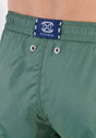 Close-up view of a men model wearing HO khaki green  Beach Boxer