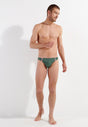 Full-body view of a men model wearing HO khaki green  Swim Micro Briefs