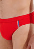 Close-up view of a men model wearing HO red  Swim Mini Briefs
