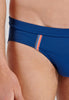 Close-up view of a men model wearing HO navy  Swim Mini Briefs