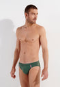 Front view of a men model wearing HO khaki green  Swim Mini Briefs