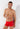 Front view of a men model wearing HO red  Swim Shorts