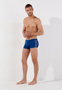 Full-body view of a men model wearing HO navy  Swim Shorts