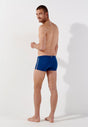General view of a men model wearing HO navy  Swim Shorts