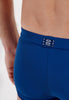 Close-up view of a men model wearing HO navy  Swim Shorts