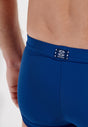 Close-up view of a men model wearing HO navy  Swim Shorts