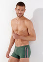 Front view of a men model wearing HO khaki green  Swim Shorts